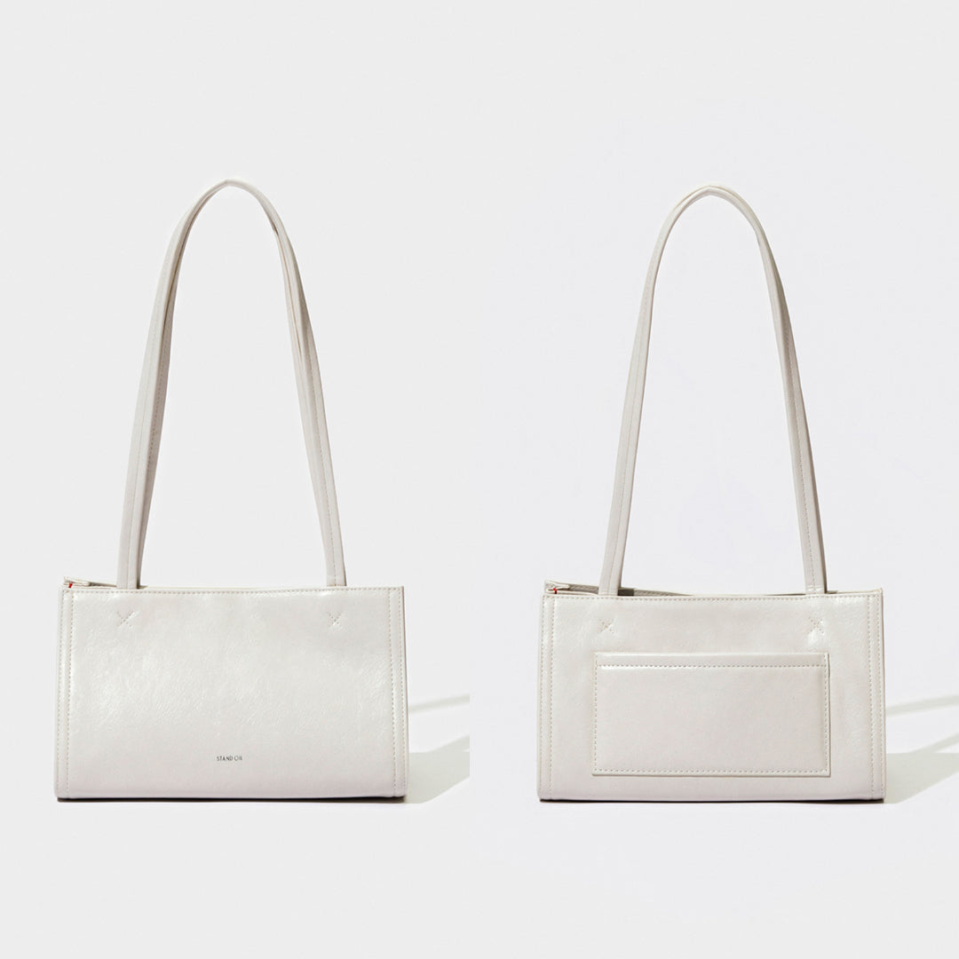 Tiny white outlet bag